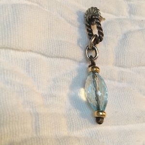 One David Yurman blue topaz dangle earring.